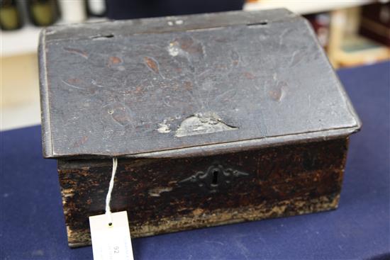 A 17th century oak and pine lap desk, W.1ft. D.7.5in. H.6.75in., initialled IP